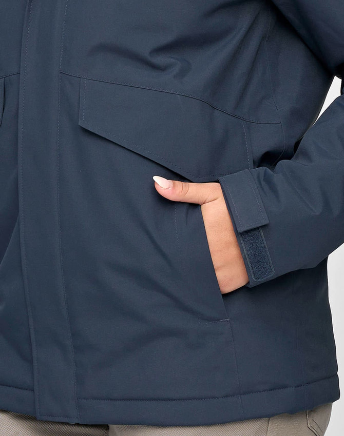 A unisex quilted waterproof jacket in navy blue, featuring a pocket and a close-up of the material.