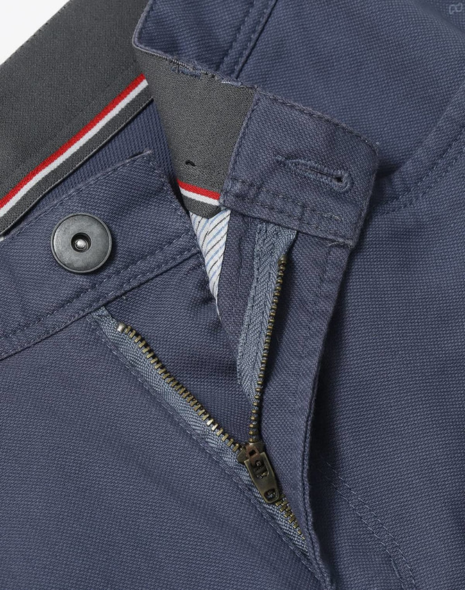Navy blue Men's Jean Style Flexi Chino Pants featuring a button and zip fly. Includes a branded logo.