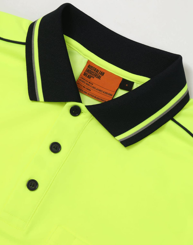 A bright yellow safety polo shirt with a navy collar and logo details.