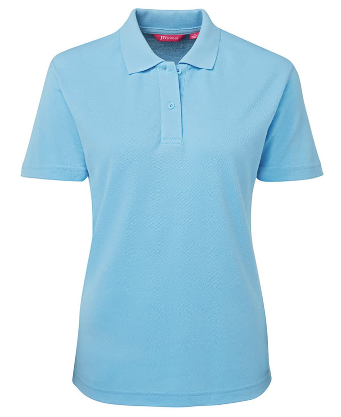 A light blue polo shirt for women featuring a collar and button placket, with a small logo displayed.