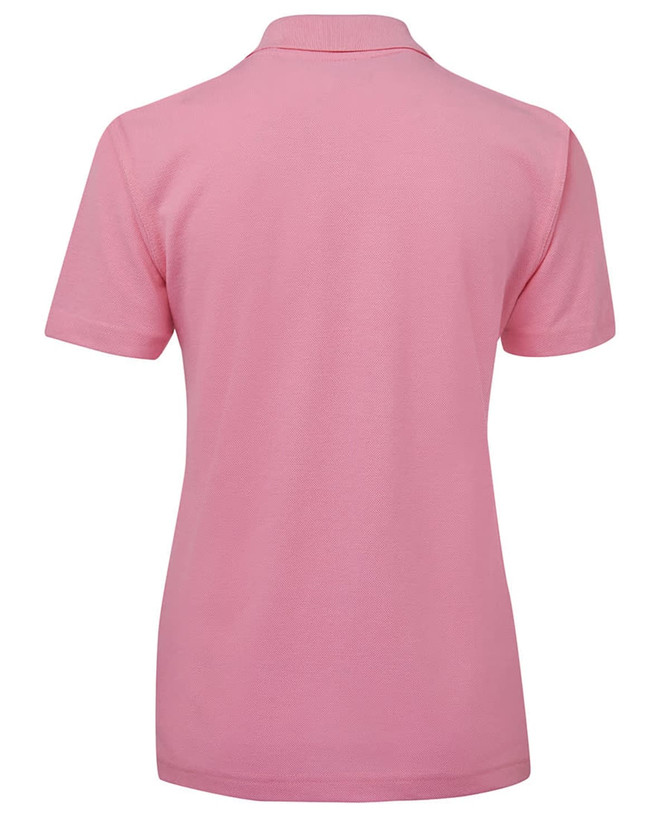 A pink polo shirt with a classic collar and short sleeves, featuring a logo on the back.