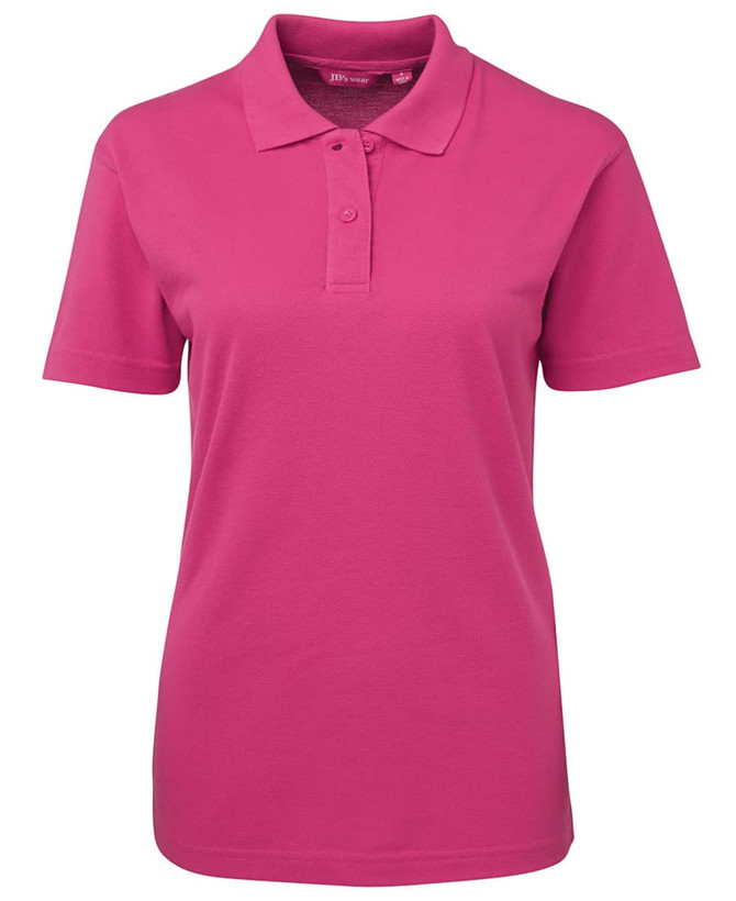 A pink women's polo shirt featuring a collar, short sleeves, and a logo on the chest.
