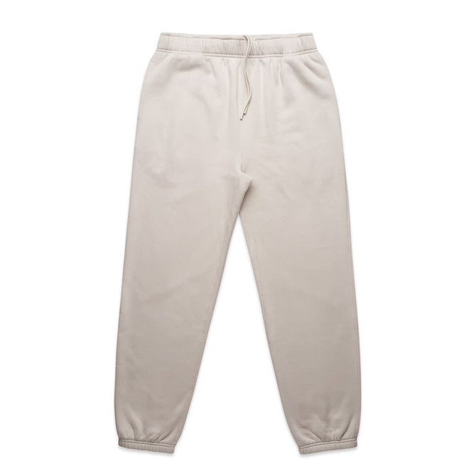 Light beige track pants with an elastic waistband and cuffs. The pants have a drawstring and feature a logo.