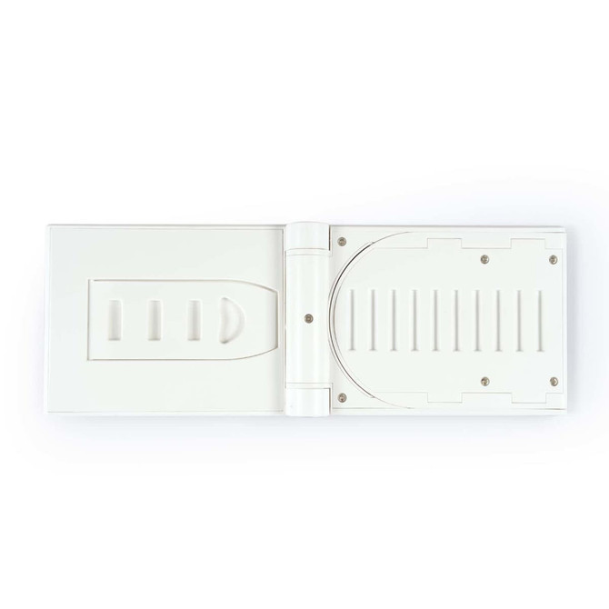 A wireless charger with a sleek, white design featuring a magnetic connector and a textured slot for device placement.