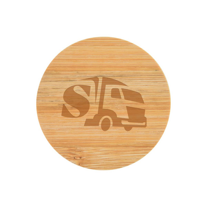 A round bamboo coaster with a truck logo etched on its surface.
