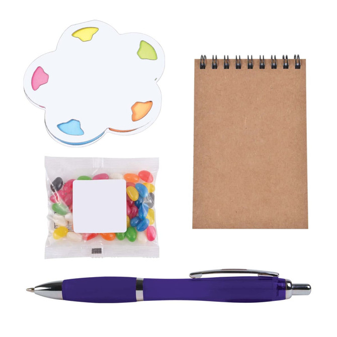 A purple pen, a brown notepad, colorful sticky notes, and a bag of jelly beans.