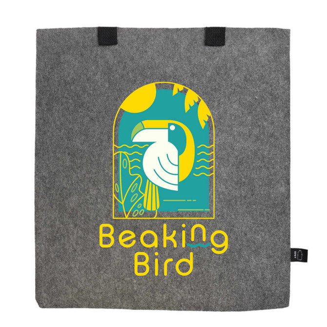 A grey felt tote bag with a colourful graphic featuring a bird, plants, and sun. It has two black handles.