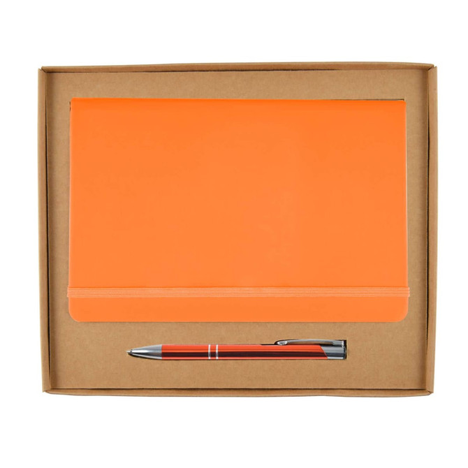An orange notebook and a silver pen are neatly presented in a brown cardboard gift box.