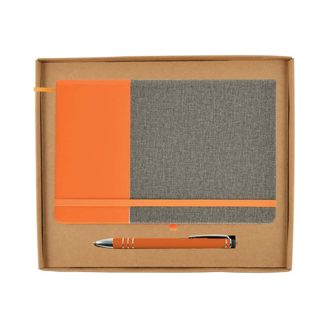 An orange and gray notebook with an elastic band and a matching orange pen inside a cardboard gift box.