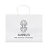 A large white paper bag with a decorative logo design and handles. Features minimalistic branding and text.