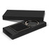A square black key ring with a textured surface, presented in a sleek black gift box.