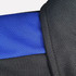 A close-up of a black polo shirt with blue accents on the collar and shoulder. Features a logo.