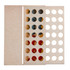 A beige game board featuring circular slots for colorful game pieces in red, blue, and yellow.
