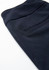 A navy stretch pant featuring a smooth fabric and a pocket detail, with a subtle branding logo.