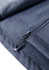 A close-up of a navy soft shell jacket featuring a zip and a hook. The material has a textured pattern.