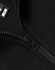 A close-up of a black fleece sweat with a half zip collar, featuring a smooth zipper and soft fabric texture.
