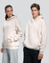 Unisex premium fleece oversized hoodie in light beige, featuring a front pocket and a hood. Logos included.