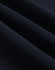 A close-up of dark navy fleece fabric, showcasing its soft texture and smooth finish.