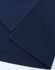 A close-up of navy blue fabric featuring stitched hems, showcasing the texture and quality of a polo shirt.