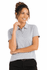 A woman is smiling while wearing a grey polo shirt. The shirt has a collar and buttons and features a logo.