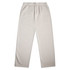 Cuffless track pants in a light beige colour, featuring an elasticated waistband and side pockets.