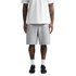 Grey track shorts with an elastic waistband, featuring a relaxed fit and a logo. Worn with a white t-shirt and dark shoes.