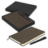 A dark green Moleskine notebook and matching pen in a black gift box. The notebook features a ribbon bookmark.