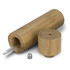 A bamboo pepper mill with a cylindrical body, a removable top, and a metal grinding mechanism.