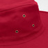 A red wide brim hat featuring gold eyelets for ventilation and a smooth fabric finish.