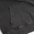 A faded black unisex hoodie featuring a front pocket and ribbed cuffs. It has a subtle logo on the fabric.