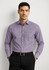 A men's long sleeve button-up shirt in purple with a pocket and a logo, worn by a model against a neutral background.
