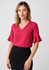 A fluted sleeve blouse in a vibrant pink colour, featuring a V-neck design and styled with a black skirt.