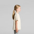 A kids' classic tee in a light beige colour, shown from the side, with short sleeves and a straight cut.