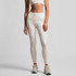 Cream-coloured active leggings with a high waistband, paired with a matching crop top. The model is wearing athletic shoes.