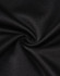 A close-up of black sustainable poly/cotton fabric, showcasing a smooth and sleek texture.