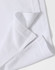 A close-up of a white polo shirt featuring a folded hem and a subtle logo.