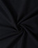 A close-up of black fabric in a swirling pattern, showcasing the texture and weave of the material.