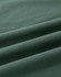 A close-up of a folded green cotton fabric, showcasing its soft texture and stretchability.