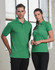 A green polo shirt featuring a logo, displayed on a male and female model against an industrial backdrop.