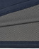 A close-up of a two-tone polo shirt featuring a navy blue top section and a grey, dotted underlay. The fabric is textured and breathable.