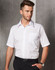 A short-sleeve white button-up business shirt with a pocket, worn by a male model against a grey backdrop.