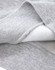 A close-up of a grey crew fleece sweatshirt showing the soft interior fabric and detailed stitching.