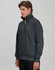 A grey 1/2 zip collar fleecy jumper featuring a logo, designed for warmth and comfort.
