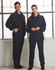 A navy track jacket with yellow accents displayed on models. The jacket features pockets and a collar.