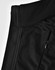 A black softshell vest featuring a zip pocket and a sleek design, with an attached logo.