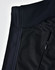 A close-up of a black ladies' softshell hi-tech vest showcasing its fabric textures and a zippered pocket.