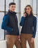A navy padded vest featuring a zip front and side pockets, modeled by a man and woman in casual attire.