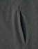 A close-up view of a grey ladies' softshell full zip hoodie showcasing the fabric texture and a zippered pocket.