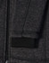A dark heather grey fleece jacket with a black ribbed cuff and zipper detail. It also features a logo.