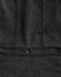 A black heather fleece jacket featuring a zip closure and two snap buttons at the hem. It has a logo present.